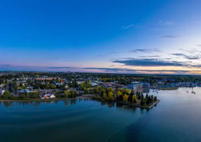 Aerial panorama image of Sylvan Lake from the water at sunset